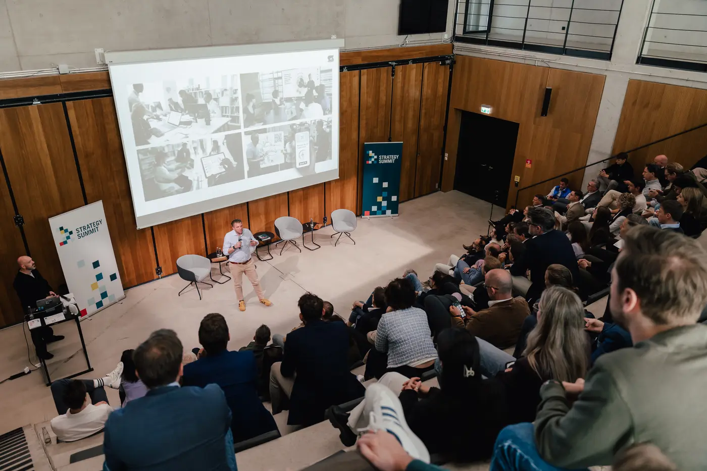 Robert Wreschniok spricht auf dem Strategy Summit vor vollem Saal